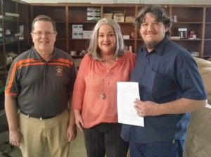 Dewayne Holloway, long time editor of the newspaper becomes the new owner.